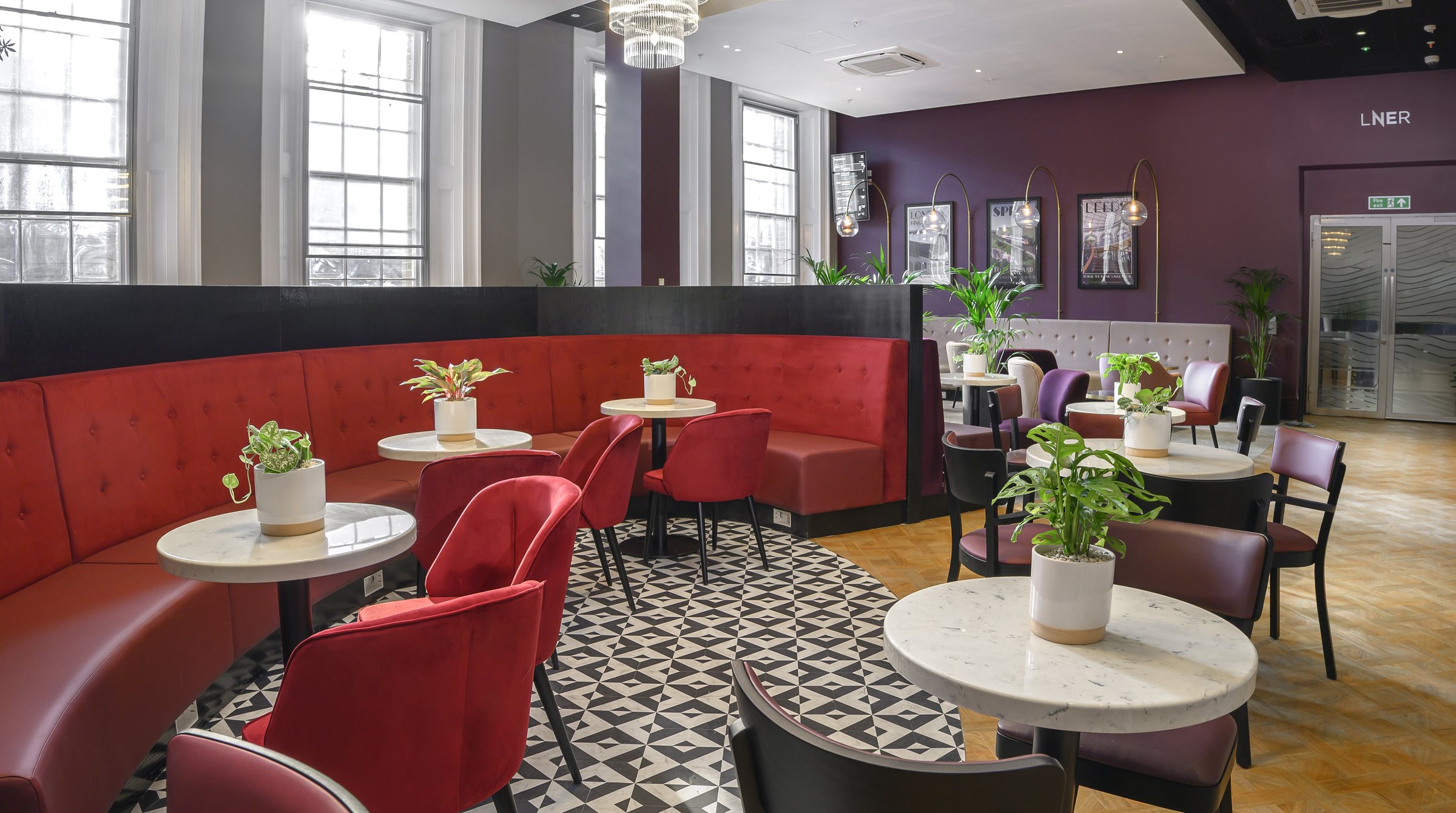 LNER First Class Lounge at King's Cross Station after refurbishment by Elm Site Services — heritage windows and contemporary seating