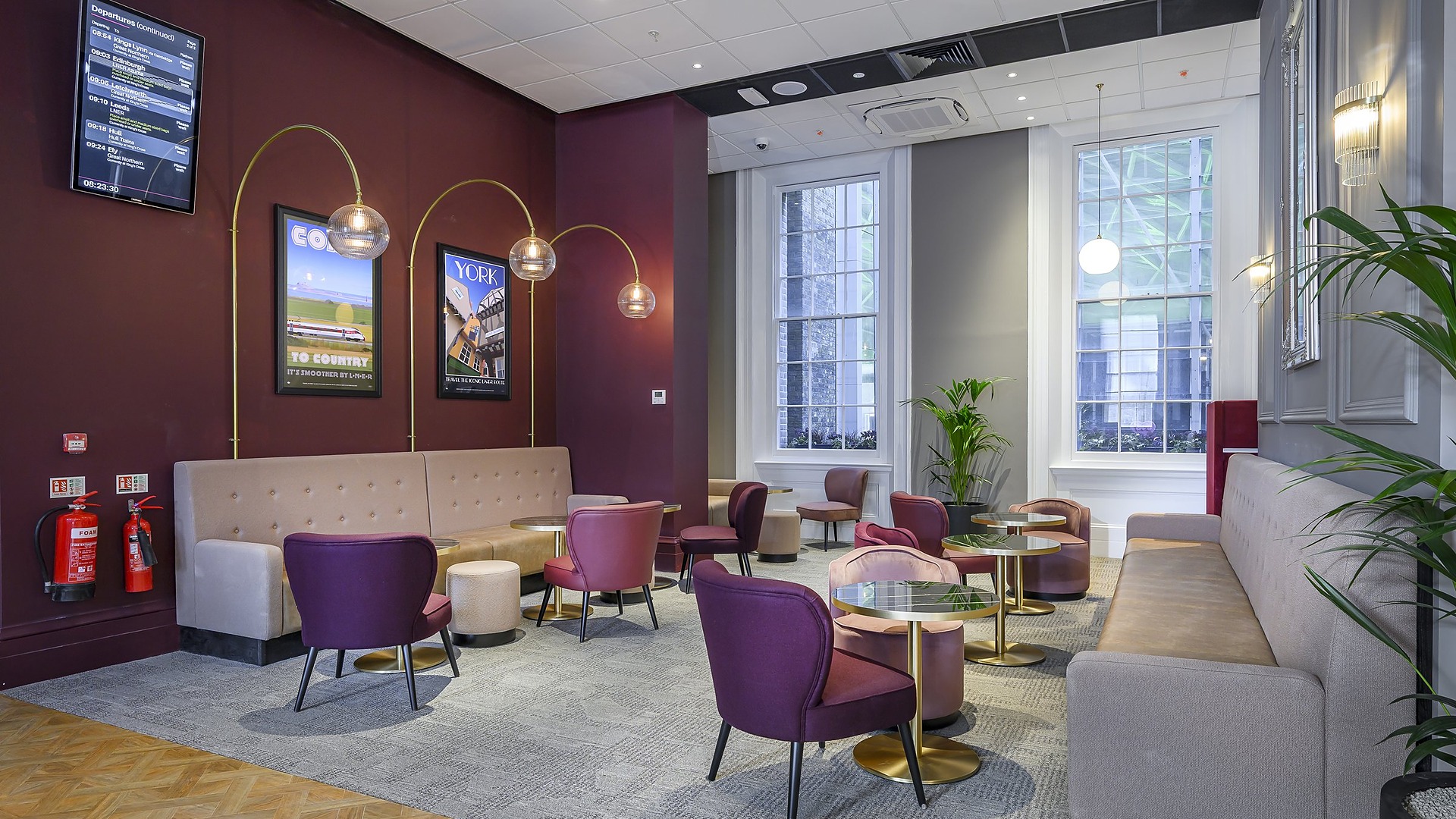 LNER First Class Lounge at King's Cross Station — entrance sign, heritage windows and seating after refurbishment by Elm Site Services